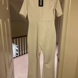 Pretty Little Things White Bodycon short sleeve jumpsuit